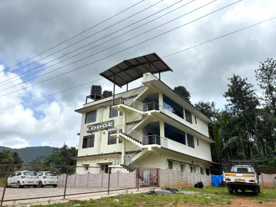 Sri Swarna Darvi Lodge Horanadu Hotels near Kerekatte Vanyajeevi Valaya Checkpost
