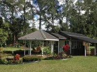 Nice little cottage oasis on a tropical fruit orchard consisting of many fruits. ハワイアン・パラダイス・パークのホテル