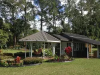 Nice little cottage oasis on a tropical fruit orchard consisting of many fruits.