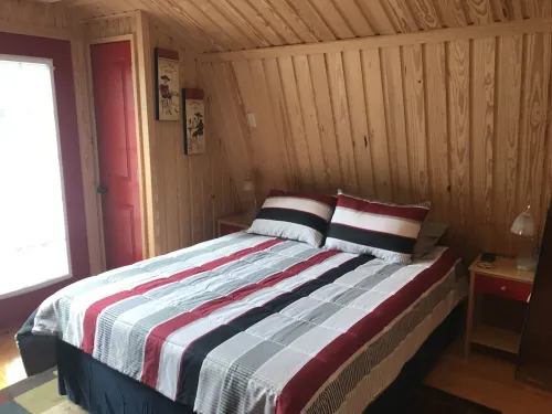 1 BR Studio/Cottage with Pool & Golf Cart/ Near Beach