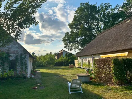 Familienfreundliche Reetdachhaushälfte im Wendland