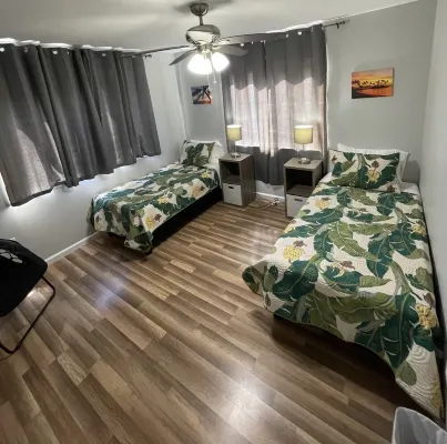 1st floor 2 bedroom/1 full bath unit on one acre family farm close to Hilo, HI.