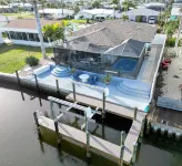 3 Bed 2 Bath on Deep Canal 5 minutes to channel CLEAN & NICE. New boat hoist
