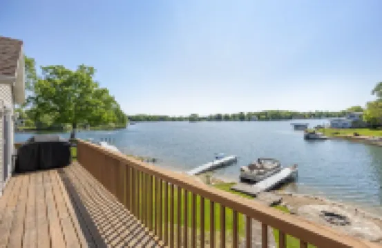 Canadian Lakes Lakefront Home with Breathtaking Sunrises and a Hot Tub!