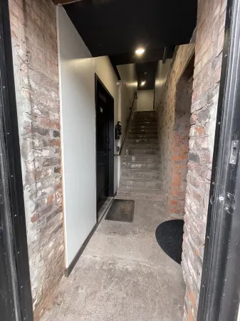 Canalside Suite- Downtown Houghton Ground Level Apartment