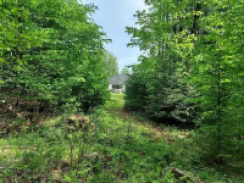 NEW for 2024, 6 person hot tub. Spacious country home with large back yard.