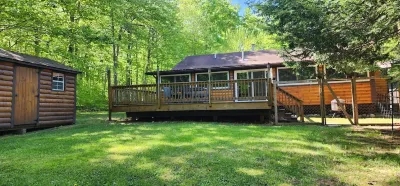 A cozy, pristine family retreat located in the town of Inlet.
