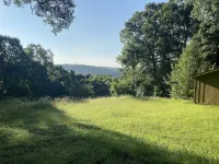 Secluded on a 6 acre ridge! 1 mile from Roaring River. Quiet and serene