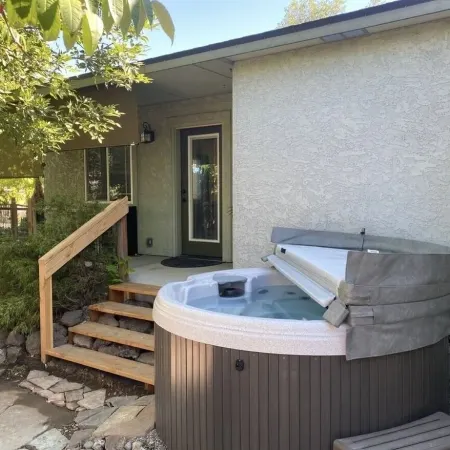 Cozy Cottage with Private Backyard.  Fire Pit, Hot Tub, Bikes, and Paddleboards