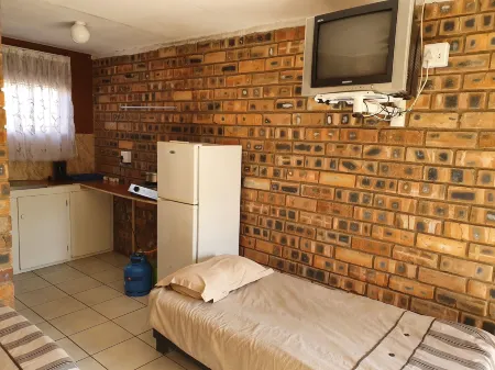 Limpopo Lodge Отели в г. Каприкорн