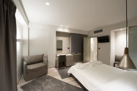 Castello City Отели рядом с достопримечательностью «Hellenic Open University Laboratories»