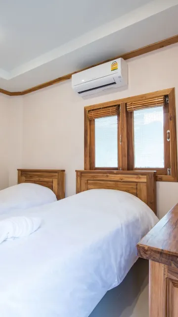 ห้องดีลักซ์เตียงเดี่ยว 2 เตียง