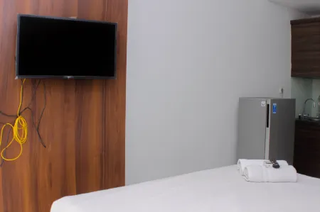 Great Location Studio Room at Patraland Urbano Apartment