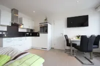 Absolute top location with sea view, balcony, W-Lan, top equipped