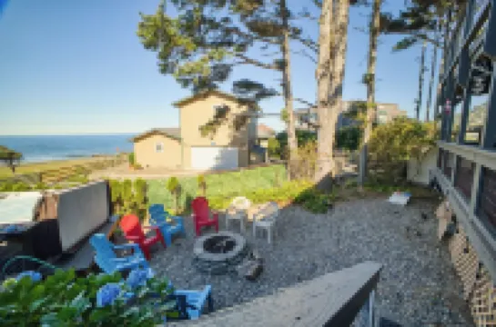 Large beach home with fantastic views of the Oregon Coast with a quaint cabin.