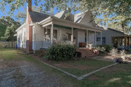 Stylish Kitchen and Cozy Front Porch - Charming Historic Retreat