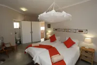 Orange House Self Catering Hotels in Aus