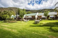 Old Mill Lodge, Seasonal Working Ostrich Farm & Restaurant, Oudtshoorn Hotels near Cango Caves
