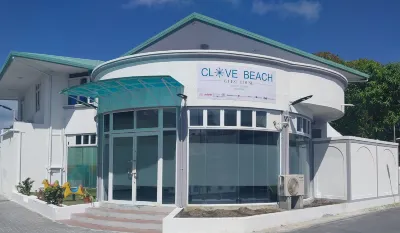 Clove Beach Hotels near Tiger shark point