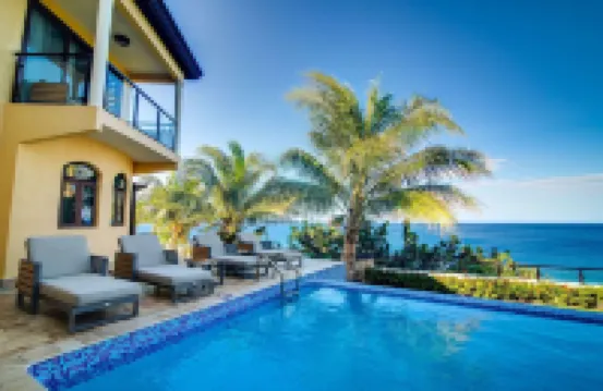 Breathtaking Oceanfront Luxe Villa in Tower Isle Jacuzzi Pool Fully Staffed