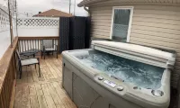 The Bear Cave w hot tub in the quaint village of Aurora