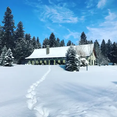 Timeless architecture, on 20 rolling  acres, just minutes from  Bigfork village.