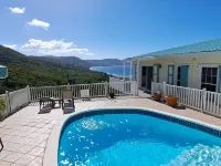 Quiet hillside villa with expansive sea, beach, and mountain views... Hotels in Northcentral