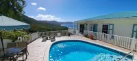 Quiet hillside villa with expansive sea, beach, and mountain views...