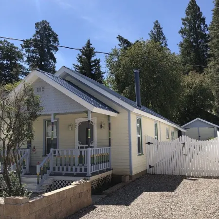 The Lilac Cottage is a charming 2-bedroom house in Cloudcroft with fenced yard!