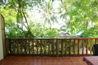 Golden Monkey Cottages - Meerblick