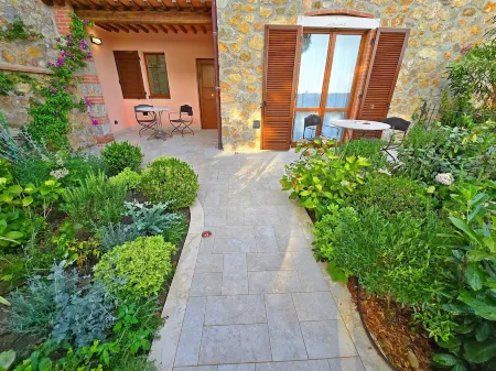 Suite with private outdoor space and garden view