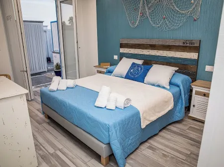 Deluxe Libeccio Apartment Отели в г. Gioia Tauro