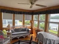 Charming cottage on Lake Willoughby w/ sun porch, private deck and dock.