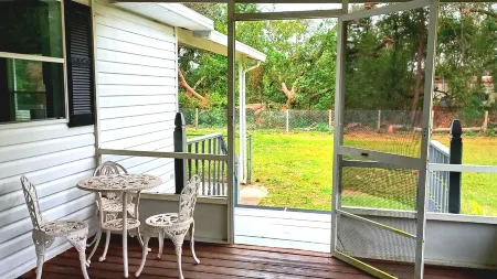 House with 3-bedroom 2 Bath on one acre of land in wonderful Wesley Chapel