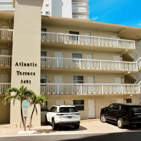 BEACHFRONT COMPLEX! STEPS FROM THE OCEAN! HEATED POOL FULL KITCHEN FREE PARKING