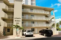 BEACHFRONT COMPLEX! STEPS FROM THE OCEAN!  HEATED POOL FULL KITCHEN FREE PARKING
