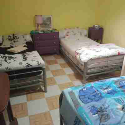 Complete house, parking, garage and garden Rooms