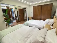 Sheraton ganna inn Hoteles cerca de Playa Mamoura