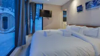 Bel Air Tremblant DOUBLE ANTARCTICA : 2 CHAMBRES, JACUZZI, SAUNA - Chalets