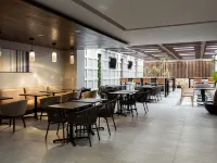Holiday Inn Express & Suites PLAYA DEL CARMEN by IHG Отели рядом с достопримечательностью «Пляжный клуб Kool»