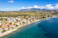 AG Stone Home - Idyllic Beachside Villa in Isthmia - Villas