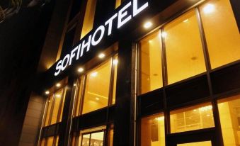 "a large hotel building with a sign that reads "" sofi hotel "" prominently displayed on the front of the building" at Sofi Hotel