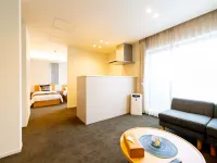 Grand Base Hiroshima Ekimae - Apartments