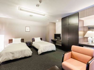 本館ツインルーム、バス付き 湯田温泉 ユウベルホテル松政の写真