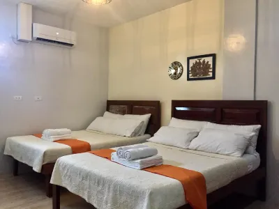 Pompeo and Luming's Inn Hotels near Puregold Calauag