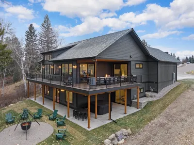 Mins to Whitefish & Glacier w/ MTN & River Views w/Hot Tub, EV Charger, Fire Pit