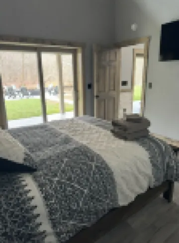 Gone Fishing cabin- family-friendly, riverfront & minutes from East Branch Lake.
