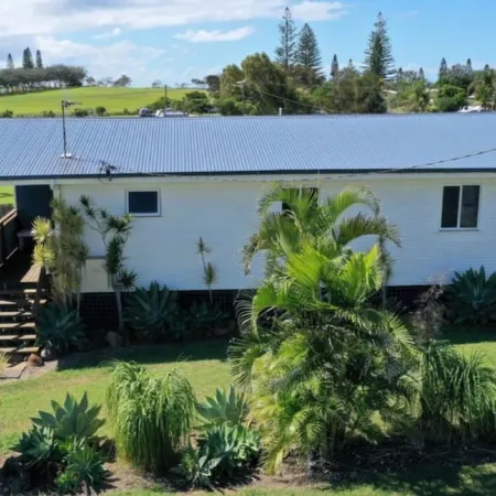 Indoor/outdoor pet-friendly beach house next to world-class beach and river.