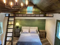 Remodeled Cabin on 40 private acres of Wind River frontage with R/V hookup.