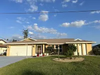Retreat with Screened Heated Pool Overlooking the Golf Course 3BR/2BA